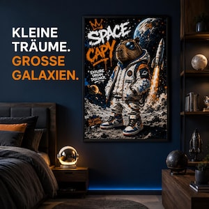 May include: A framed wall art print featuring a capybara astronaut in a space suit and sunglasses standing on a lunar surface with a rocket launching in the background. The text reads SPACE CAPY, EXPLORE DREAM DISCOVER, and NO LIMITS JUST STARS.