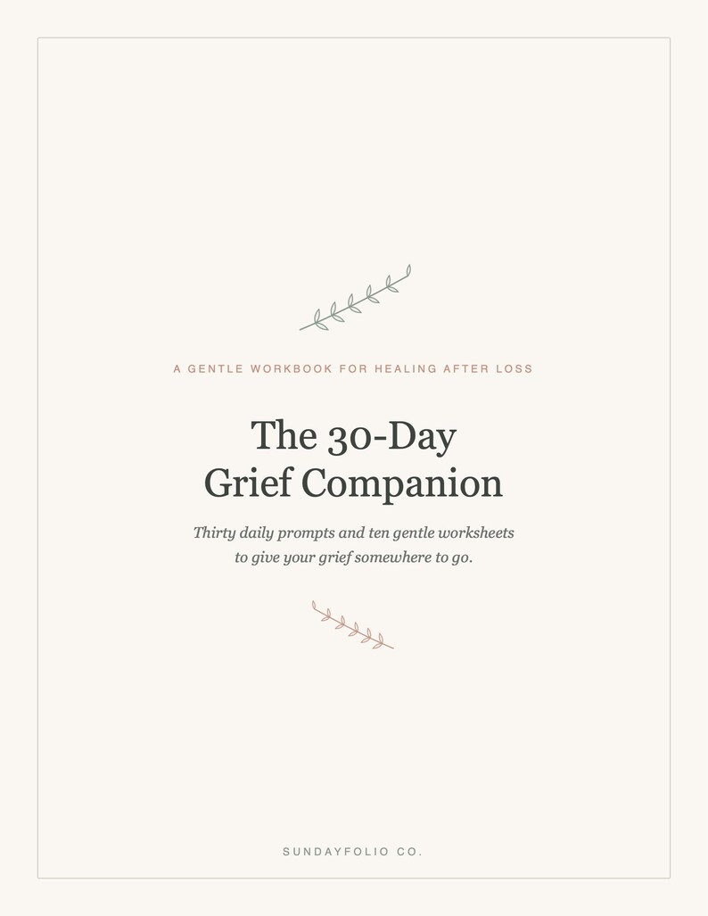 May include: A cream-coloured workbook cover titled The 30-Day Grief Companion, A Gentle Workbook for Healing After Loss. It features two small leaf illustrations, the subtitle Thirty daily prompts and ten gentle worksheets, and Sundayfolio Co.
