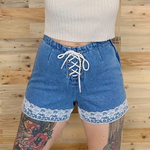 Jean shorts with ties on side best sale