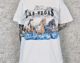 Camiseta vintage de los 90 con estampado de caballos salvajes de Las Vegas.