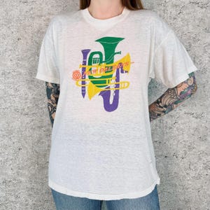 Camiseta vintage de los 80, fina como el papel, suave, estilo Nueva Orleans.