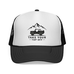May include: A black and white trucker hat featuring a graphic of a mountain range and an off-road vehicle. The text TAKE YOUR TOP OFF is printed in black below the vehicle. The hat has a white front panel, a black brim, and black mesh sides.