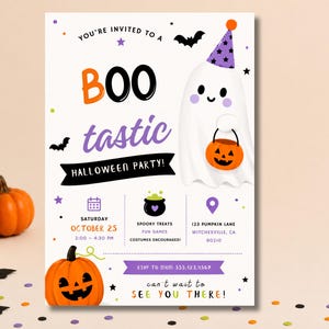 May include: A white Halloween party invitation card featuring a cartoon ghost wearing a purple star-patterned party hat and holding an orange jack-o'-lantern bucket. The text reads: YOU'RE INVITED TO A BOO tastic HALLOWEEN PARTY! SATURDAY OCTOBER 25.