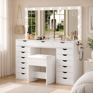 May include: A white vanity table featuring a large rectangular mirror surrounded by integrated LED lights. The unit includes a central tabletop, two side columns with seven drawers each, and a matching white cushioned stool tucked underneath.