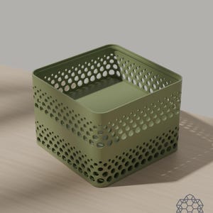 May include: A square olive green storage bin featuring a perforated pattern of circular cutouts that vary in size across the sides. The container has a solid flat base and an open top with a reinforced rim, constructed from a smooth, matte material.