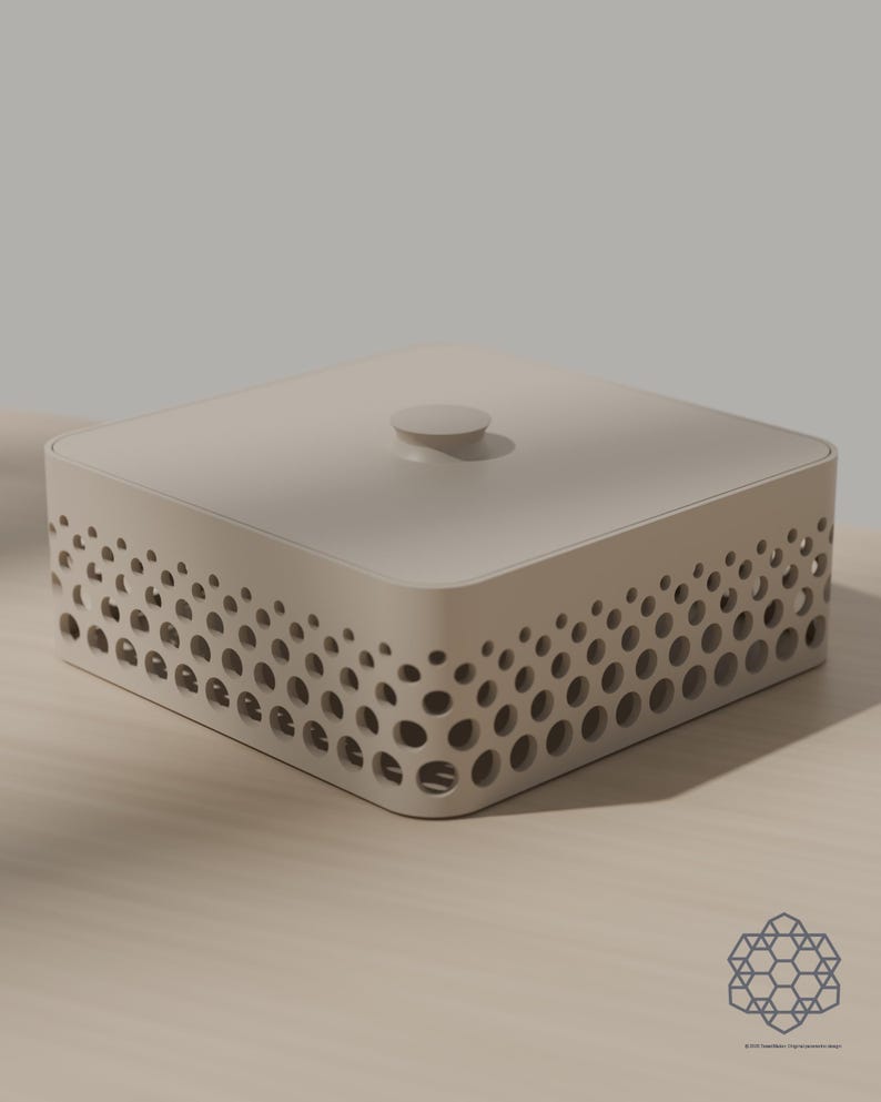 May include: A square, light beige storage box with a flat lid and a small central knob. The sides feature a perforated pattern of circular cutouts that vary in size, creating a gradient effect from larger holes at the bottom to smaller ones.