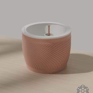 The Aquapot self watering planter in peach pink, its spiral ridged wall catching soft light, with the white soil insert and the float cap in the fill tube on a wooden table. Images include 3D-rendered visualizations of the exact print files.