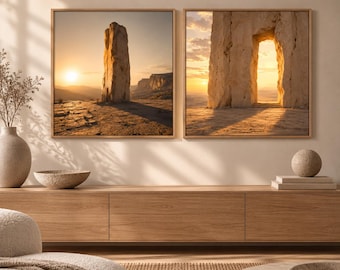 May include: Two square framed wall art prints featuring desert landscapes at sunset. The left print shows a tall, solitary rock formation on a rocky plateau. The right print displays a large stone archway framing a golden horizon and distant hills.