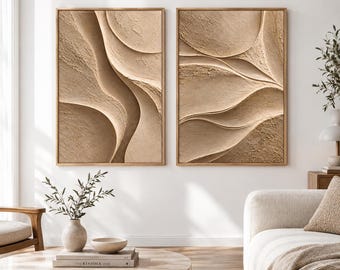 May include: Two rectangular wall art pieces featuring a textured, monochromatic beige surface with raised, sweeping wave-like patterns. Each piece is encased in a thin, light-toned wooden frame, displaying a consistent sand-colored finish.