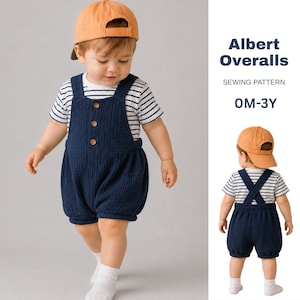 May include: A sewing pattern for Albert Overalls sized 0M-3Y, featuring a navy blue textured romper with three buttons worn over a white and navy striped short-sleeve shirt, paired with an orange baseball cap and white socks.