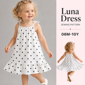 May include: A white dress with black polka dots, featuring thin shoulder straps with small bows and a ruffled hem. The text on the right side reads Luna Dress SEWING PATTERN 06M-10Y. The dress is shown from both the front and the back views.