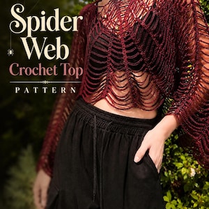 May include: A dark red crochet top with a spider web pattern, long sleeves, and a cropped hem. The text "Spider Web Crochet Top PATTERN" is printed on the left side of the image, accompanied by a small spider icon and decorative lines.