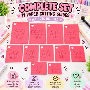 May include: A complete set of 11 rectangular pink paper cutting guides, each featuring a heart-shaped hole at the top and embossed dimensions including 6x9, 5.5x8.5, A5, 5x8, 5x7, 4x6, A6, 4x5, 3x5, 4x4, and 3x3 inches for paper trimming.