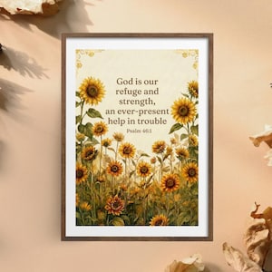 May include: A framed wall art print featuring a field of yellow sunflowers with green stems and leaves. The center contains the text: God is our refuge and strength, an ever-present help in trouble. Psalm 46:1, printed in dark brown lettering.