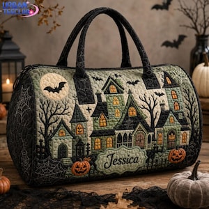 May include: A quilted duffel bag featuring a Halloween-themed scene with a haunted house, jack-o'-lanterns, bats, and spiderwebs in shades of green, black, and orange. The bag includes two top handles and a central label with the name Jessica.