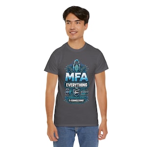 May include: A dark gray short-sleeve t-shirt featuring a graphic print with a blue padlock, a fingerprint icon, and the text MFA EVERYTHING. Below are icons of a smartphone, a shield with a key, and the text AUTHENTICATE OR VALIDATE C-CONNECTIONS.