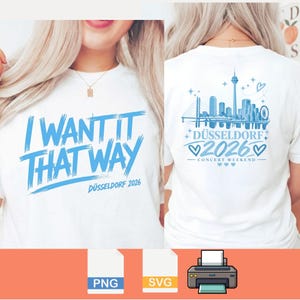 Könnte beinhalten: Ein weißes T-Shirt mit blauen Grafikdesigns. Die Vorderseite zeigt den Text I WANT IT THAT WAY und DÜSSELDORF 2026. Die Rückseite zeigt eine blaue Skyline-Illustration von Düsseldorf mit dem Text DÜSSELDORF 2026 CONCERT WEEKEND und Herzen.