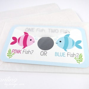 May include: A gender reveal card with a pink fish and a blue fish. The text reads "ONE Fish TWO Fish" and "PINK Fish? OR BLUE Fish?"