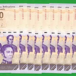 May include: A collection of ten 200 Bolívares banknotes from the República Bolivariana de Venezuela, featuring portraits of historical figures, the number 200, and unique serial numbers ranging from A11140814 to A11140823 in a tan color.