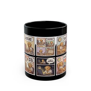 May include: A black ceramic mug featuring a multi-panel comic strip of a golden retriever working at a computer. The comic includes speech bubbles with text such as I will start after one more coffee, I work better in a clean space, and I am a machine.