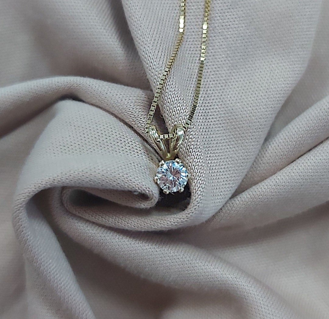 ciondolo prezzo diamante carati