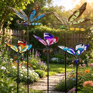 May include: Five metal garden stakes featuring butterfly and dragonfly designs with stained glass-style wings in blue, green, orange, purple, and white. Each insect is mounted on a thin black pole, showcasing intricate wire detailing.