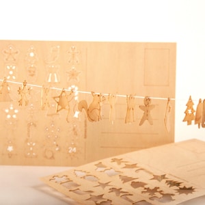 Postkarten aus Holz – 24 Symbole/Adventskalender 3er-Set