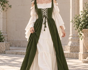 May include: A floor-length dress featuring a cream-colored tiered skirt and long, flared sleeves paired with a dark olive green bodice. The bodice includes a lace-up front with decorative eyelets and shoulder straps that tie into bows at the top.
