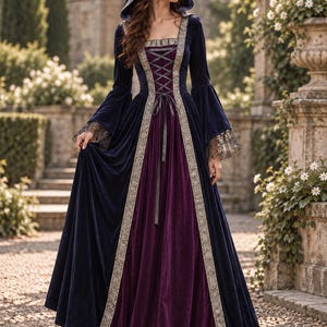 May include: A floor-length velvet dress featuring a deep navy blue hooded bodice and a dark purple skirt. The garment includes long flared sleeves with black lace trim, a square neckline, and a central corset-style lace-up panel with silver-toned embroidery along the edges.