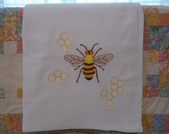 Paño de cocina con saco de harina de abejas