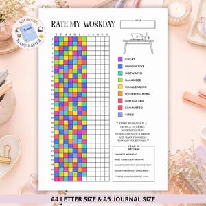 May include: A printable Rate My Workday tracker sheet featuring a grid for tracking daily moods with color-coded categories including Great, Productive, Motivated, Balanced, Challenging, Overwhelming, Distracted, Exhausted, and Tired, plus a Year in Review section.