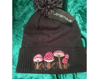 Magical Mushroom Pom Pom Beanie: Embroidered Toadstool Design, Cozy Unisex Hat for Mushroom Lovers and Foragers!"