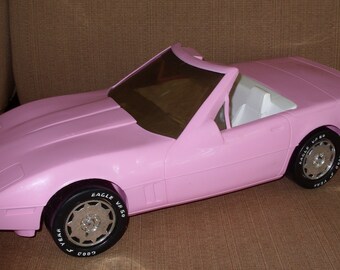 barbie doll pink car