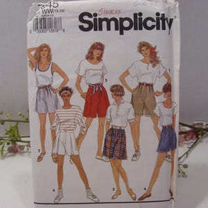 May include: Simplicity sewing pattern 7845 for women's shorts. The pattern shows five different styles of shorts, including a pair of red shorts, a pair of white shorts, a pair of blue shorts, a pair of khaki shorts, and a pair of plaid shorts.