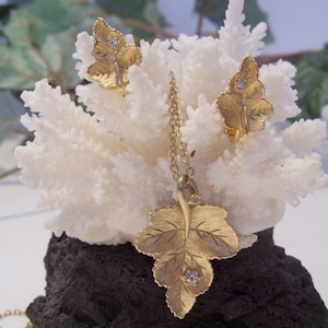 Avon Radiant Leaf Pendant Necklace and Matching Clip Earrings with Small Clear Rhinestone Accent Vintage Collectible Avon Jewelry Great Gift