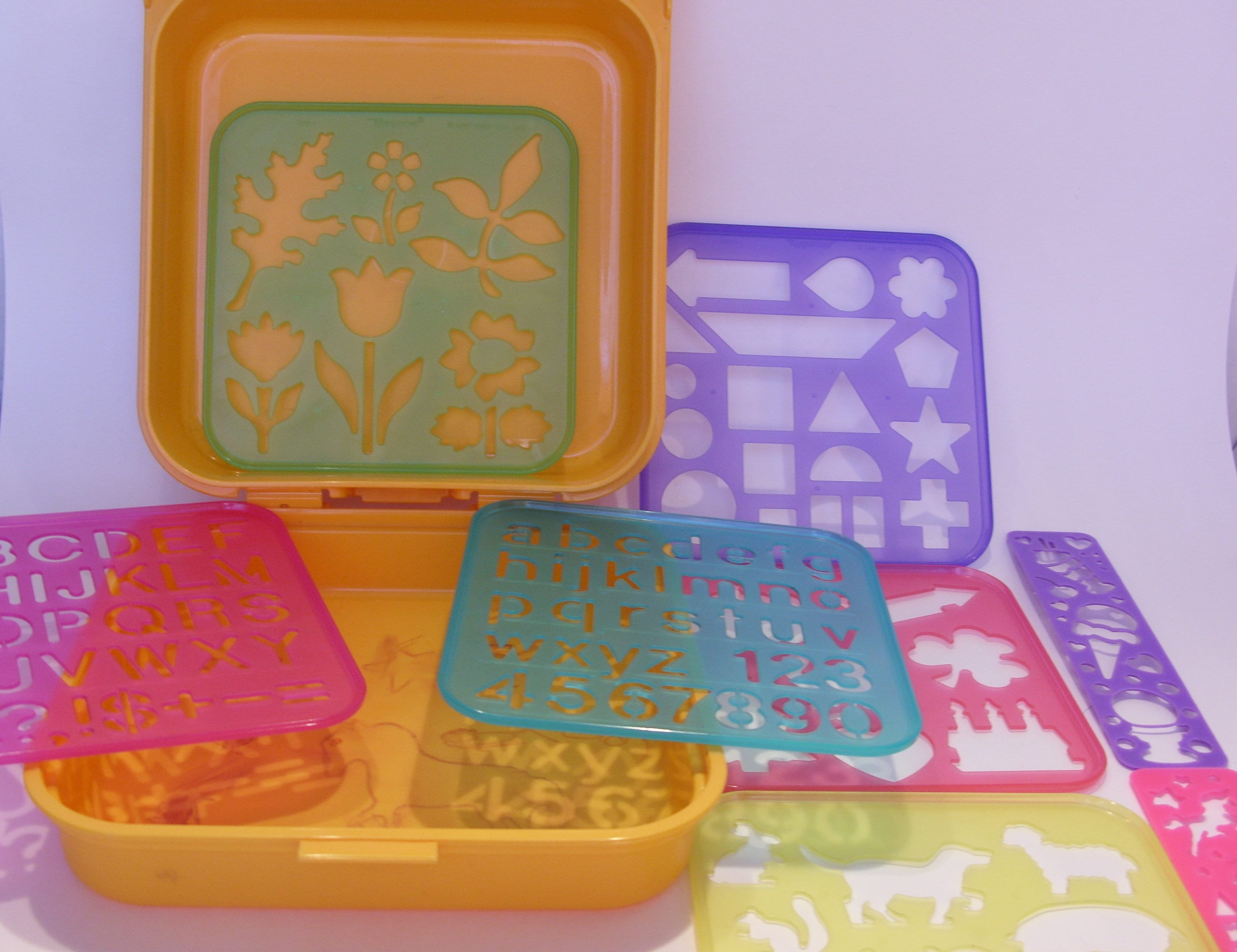 Tupperware Stencils for sale Only 3 left at 75