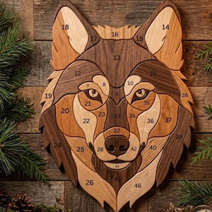 May include: A wooden wall art piece shaped like a wolf head, constructed from interlocking segments of light, medium, and dark wood. Each segment is numbered, creating a mosaic effect. The wolf features detailed eyes and a nose, with a natural wood grain finish throughout the entire piece.