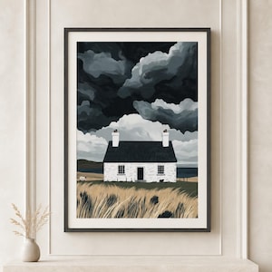 May include: A framed art print depicting a white cottage with a dark roof set against a dramatic, stormy sky filled with heavy grey and black clouds. The foreground features tall, golden-brown grasses, and the scene includes two small sheep.