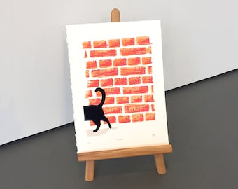 LUCKY limited edition hand screen printed - flocked black cat against a bright brick wall - 212x285mm art print / wall art