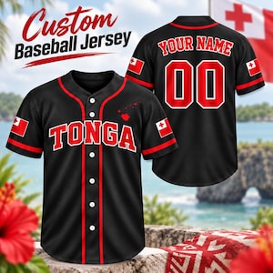 May include: A black baseball jersey with red trim, featuring the word TONGA in red letters on the front, a small red map graphic, and the Tongan flag on the sleeves. The back displays the text YOUR NAME and the number 00 in red with white outlines.