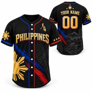 May include: A black baseball jersey featuring the word PHILIPPINES in gold lettering on the front, a yellow sun emblem, and red and blue diagonal stripes. The back displays the text YOUR NAME and the number 00 in gold with a mountain landscape graphic.