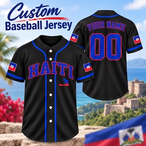 May include: A black baseball jersey with blue piping, featuring the word HAITI in blue letters with red outlines on the front. The sleeves display the Haitian flag, and the back shows the text YOUR NAME above the number 00 in blue and red.