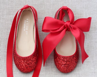 red sparkle shoes child