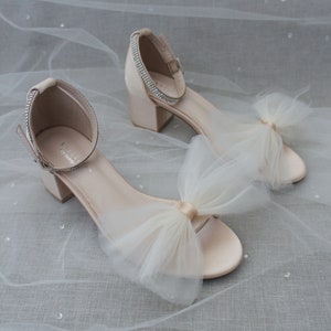 Oversized bow heels shop