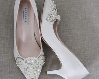 heels with pearls on them