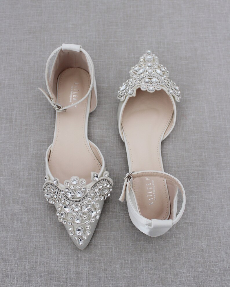 ivory pointed flats