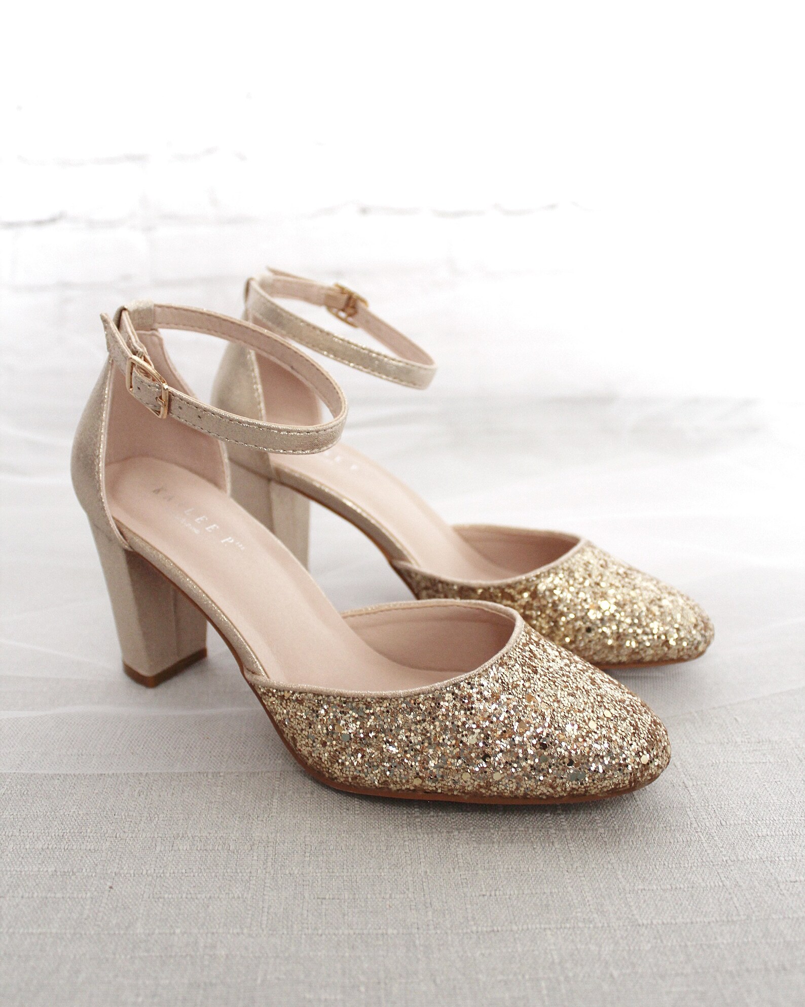 gold bow block heel