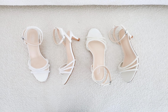 white dress sandals low heel Ankle Strap Block Heels adorned with glamorous faux pearl embellishments Marc Fisher Women's Sagi Slip-On