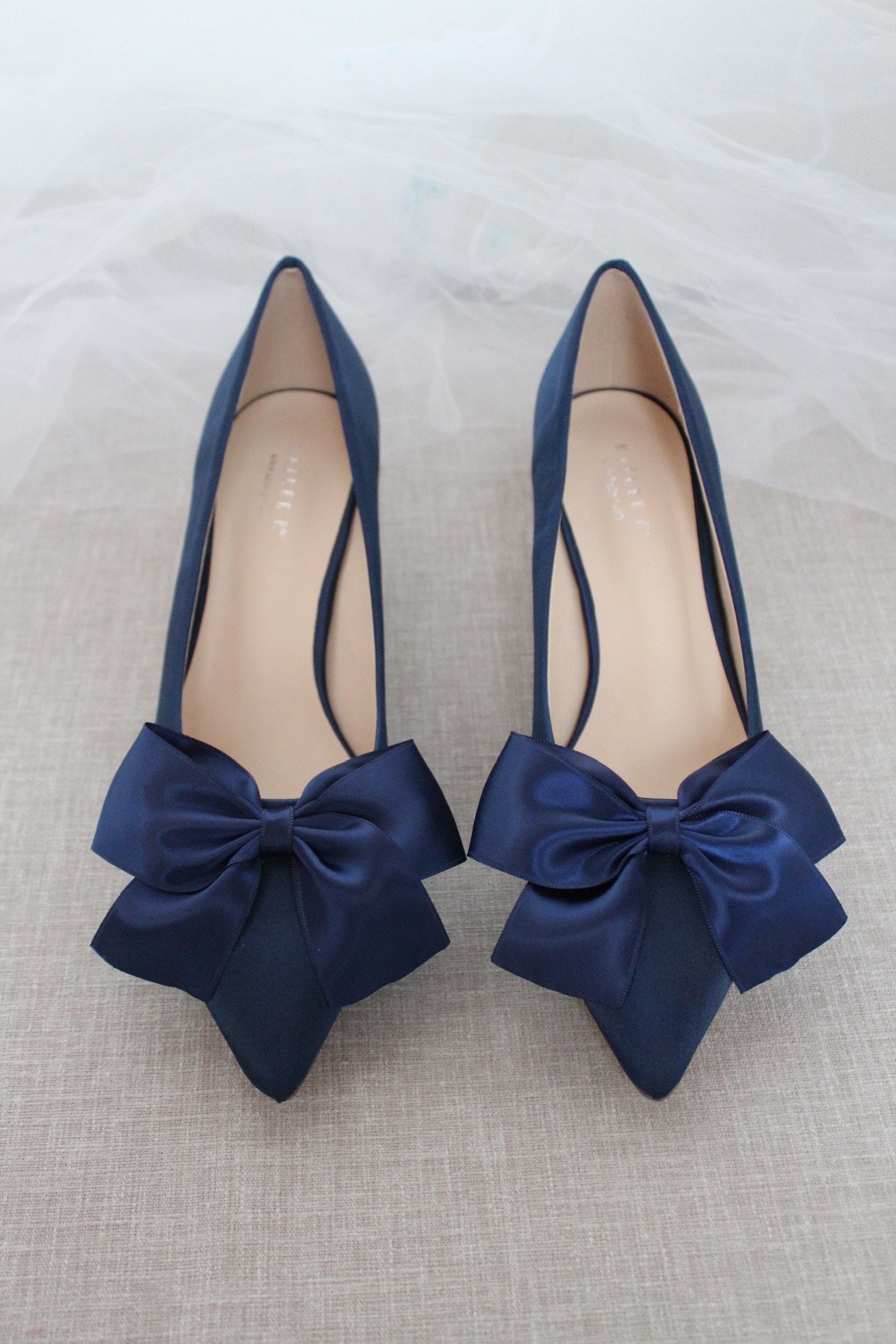 satin pumps with bow