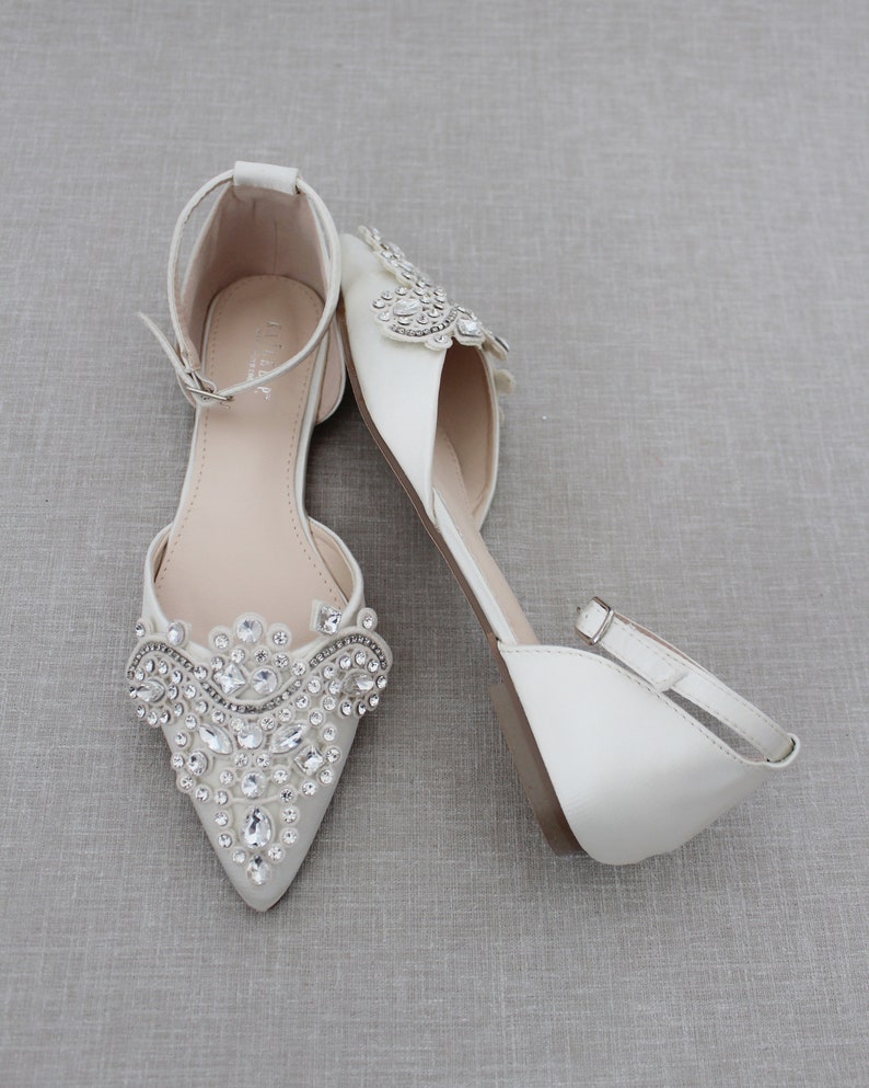 ivory pointed flats